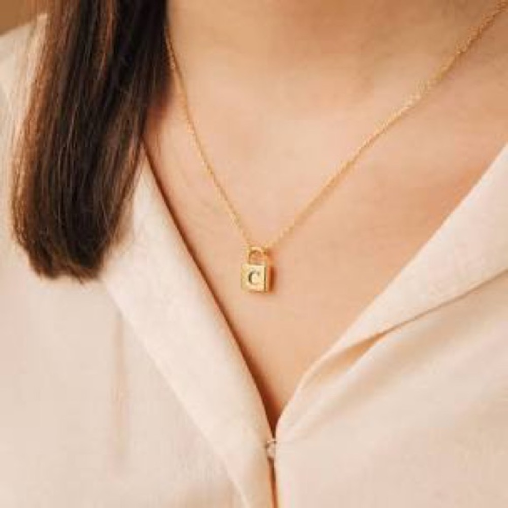 Gold lock necklace w/ engraved initial! “I” & “M”